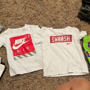 2-size 4 Nike shirts